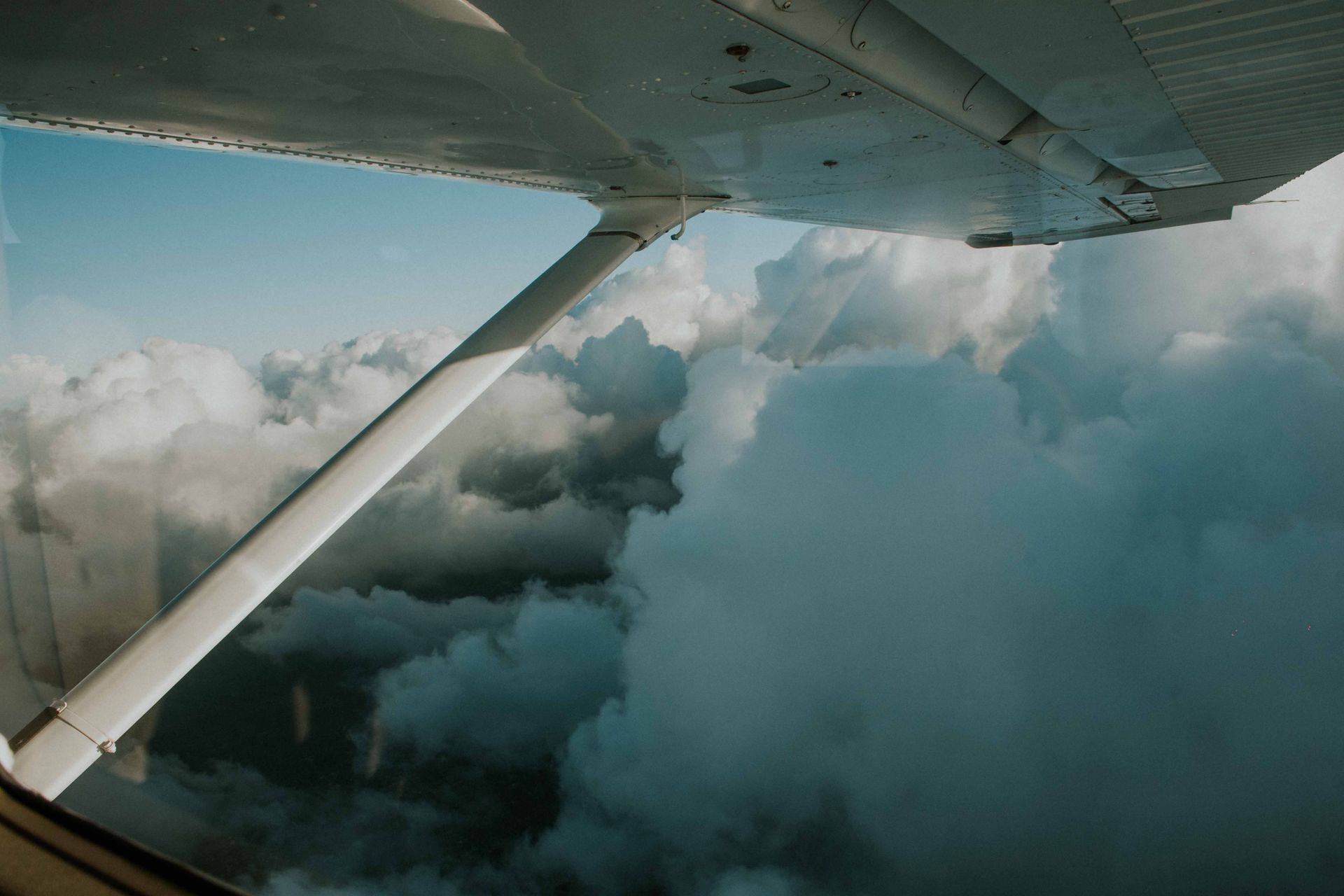 Clouds seen from an aircraft window; travel inspiration photograph